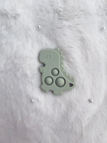 Силиконова гризалка динозавър с "pop-it " ефект