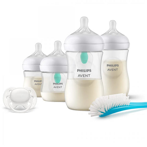 Комплект за новородено Philips AVENT SCD657/11 с 4 шишета за хранене Natural Response с биберони без протичане, клапа AirFree, залъгалка Ultra Soft и четка за почистване